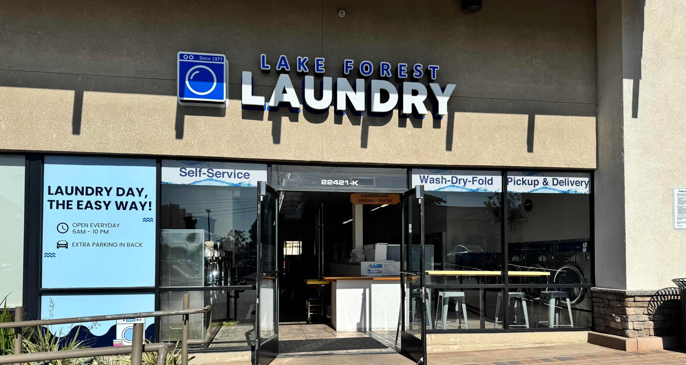 Lake Forest Laundry storefront on El Toro Road, with self-service, wash-dry-fold, and pickup & delivery signage